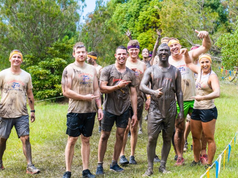 muddy team obstacle course having fun raw challenge